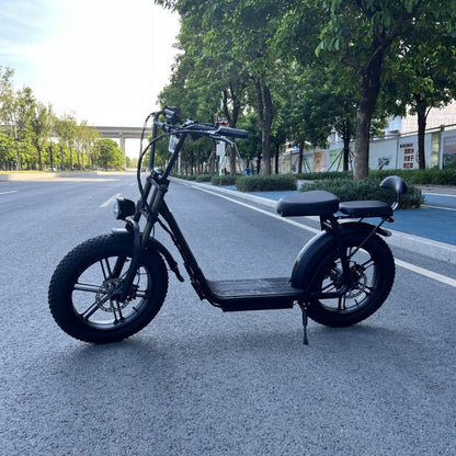 Side view of black AS202 Electric Scooter on pavement, highlighting its commuter-friendly design and sturdy build.